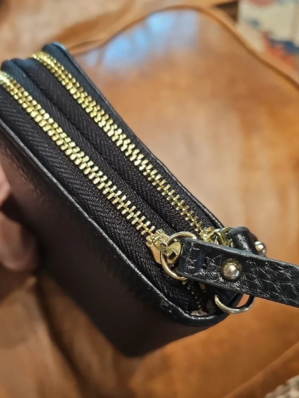 Anne Klein Black Pebbled Zip-Around Wallet with Gold Emblem